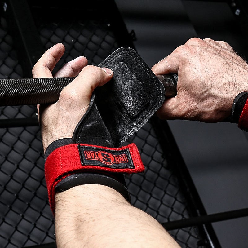 Man using Heavy Duty Lifting Strap on one hand for pull-ups and bar exercises