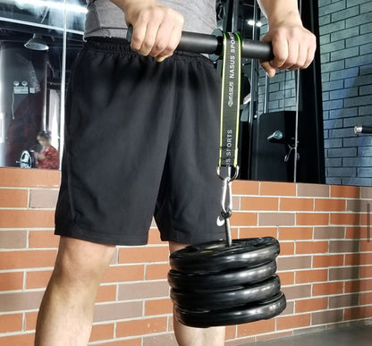 Close-up of man using Arm Strength Training Fitness Machine showing how weights attach to the rope and bar
